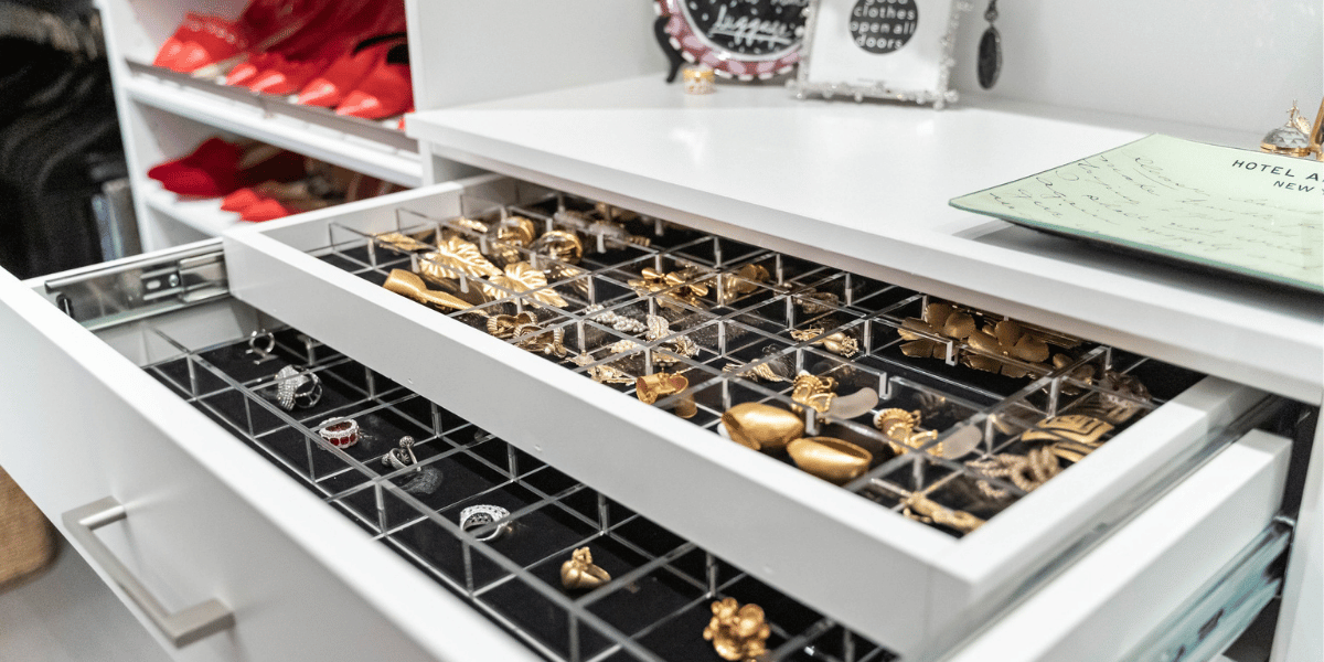 Image of jewelry organizer drawer inserts in a custom closet system. 